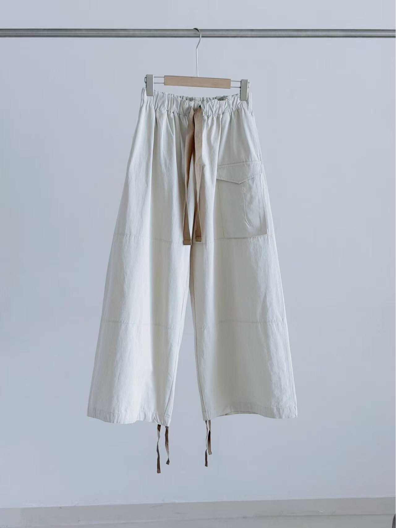 

Japanese Style Women s Parachute Work Pants with Drawstring and Elastic Cuffs, Versatile Loose Fit for Early Spring. Large