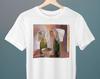 Still Life with Bottles and Breton Bonnets, Pierre Roy, Unisex T-Shirt, Art T-Shirt, Gift for Her, Gift for Him, Art Lover Gift