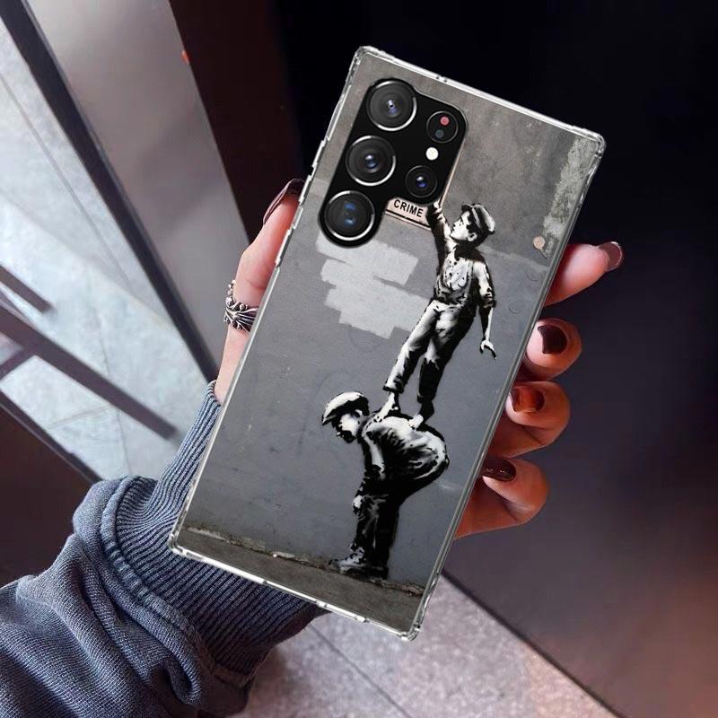 Street Art Banksy Graffiti Phone Case For Samsung Galaxy S23 S24 S25 Edge S26 Ultra S22 + S21 Plus S20 FE Cover Silicone Print S