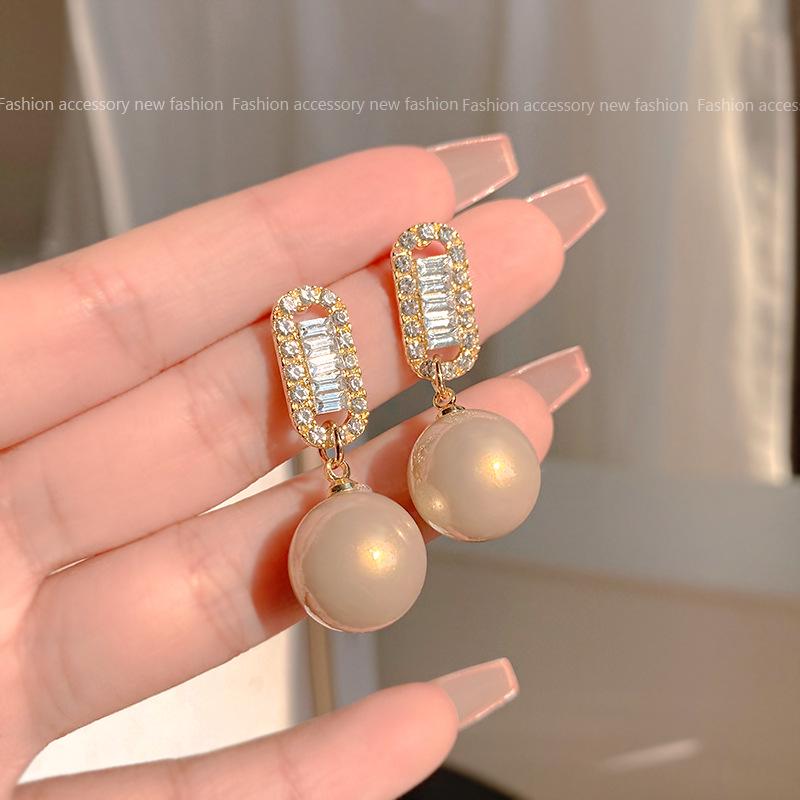 

Корейські срібні сережки 925 проби з розкішними діамантовими китицями - Елегантний та простий дизайн Silver Needle Version