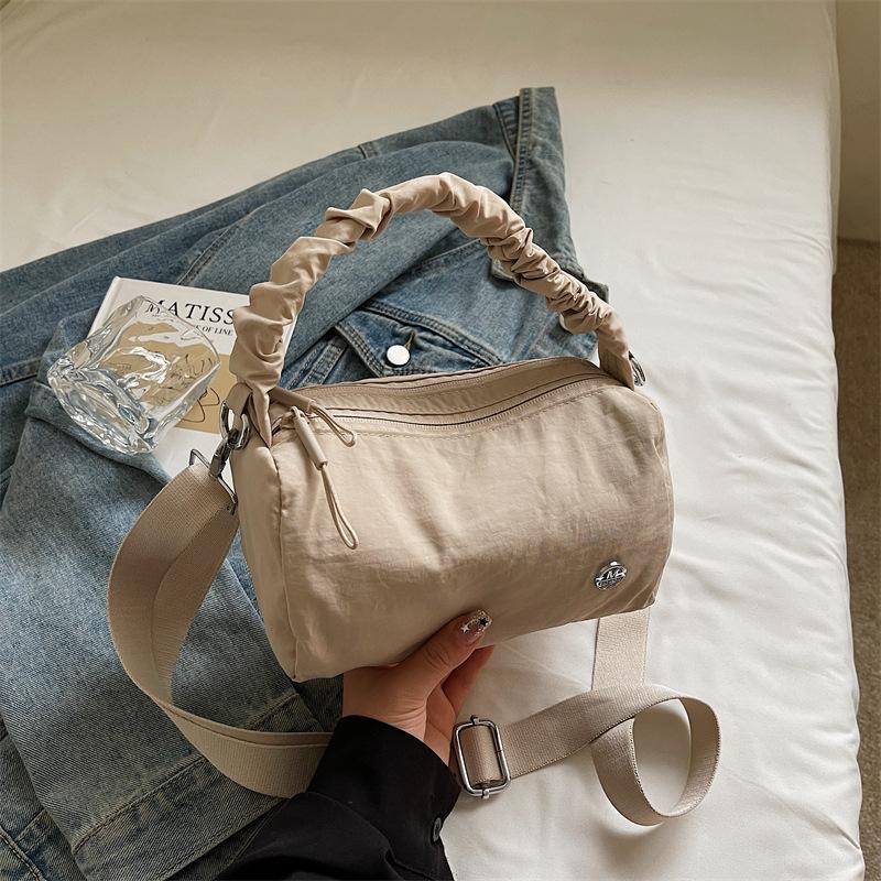 

Fashion and foreign style large-capacity messenger bag trendy simple pleated large-capacity nylon cloth dumpling bag women s shoulder bag