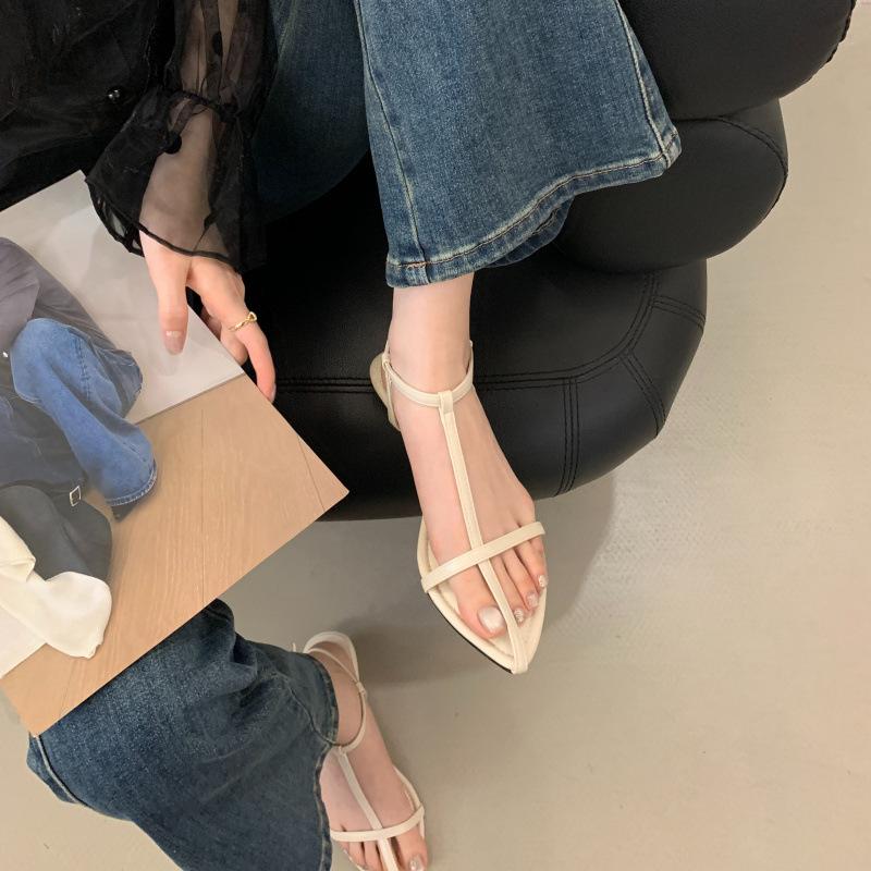 New pointed open-toed one-word buckle sandals women's hollow simple sexy cross strap beach shoes