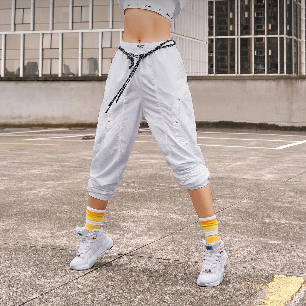 Li Ning CF X Haizhenwang Designer Collaboration SS22 Solid Color Reflective Detail Elastic Waist Jogger Pants Women Bottoms White AYKSB54-1