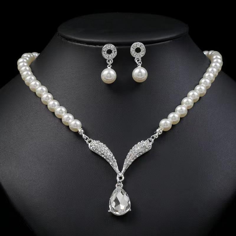 Korean version of personalized pearl necklace earrings set women's fashion temperament explosive alloy electroplating bridal dress accessories