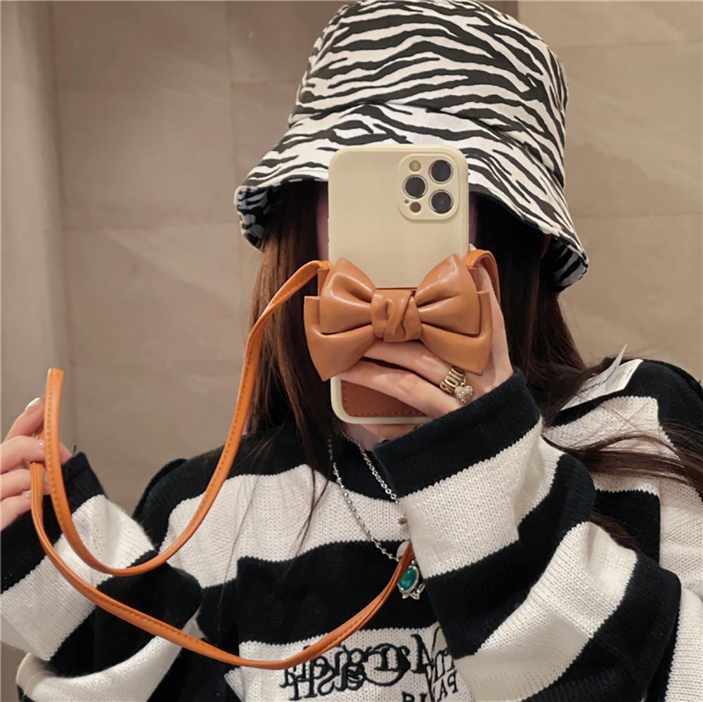 Custodia per telefono con cordino in pelle Pu con fiocco carino 3D per Iphone 11 12 13 Pro Xs Max X Xr 7 8 Plus Cover posteriore morbida e di lusso