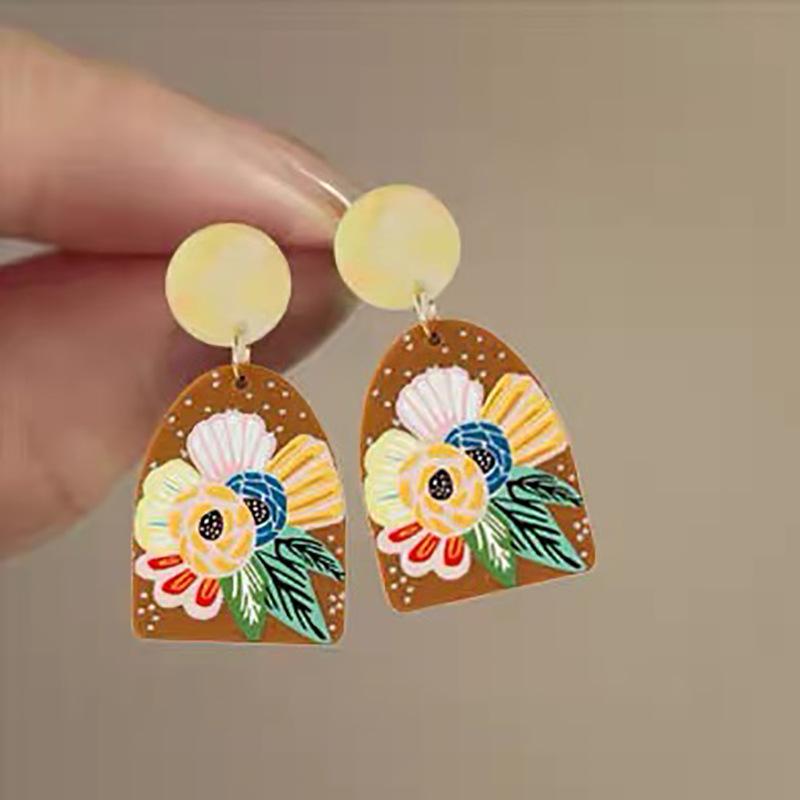 

Holiday style yellow ginkgo biloba earrings temperament retro high-end stud earrings fashion Hong Kong style light luxury earrings women