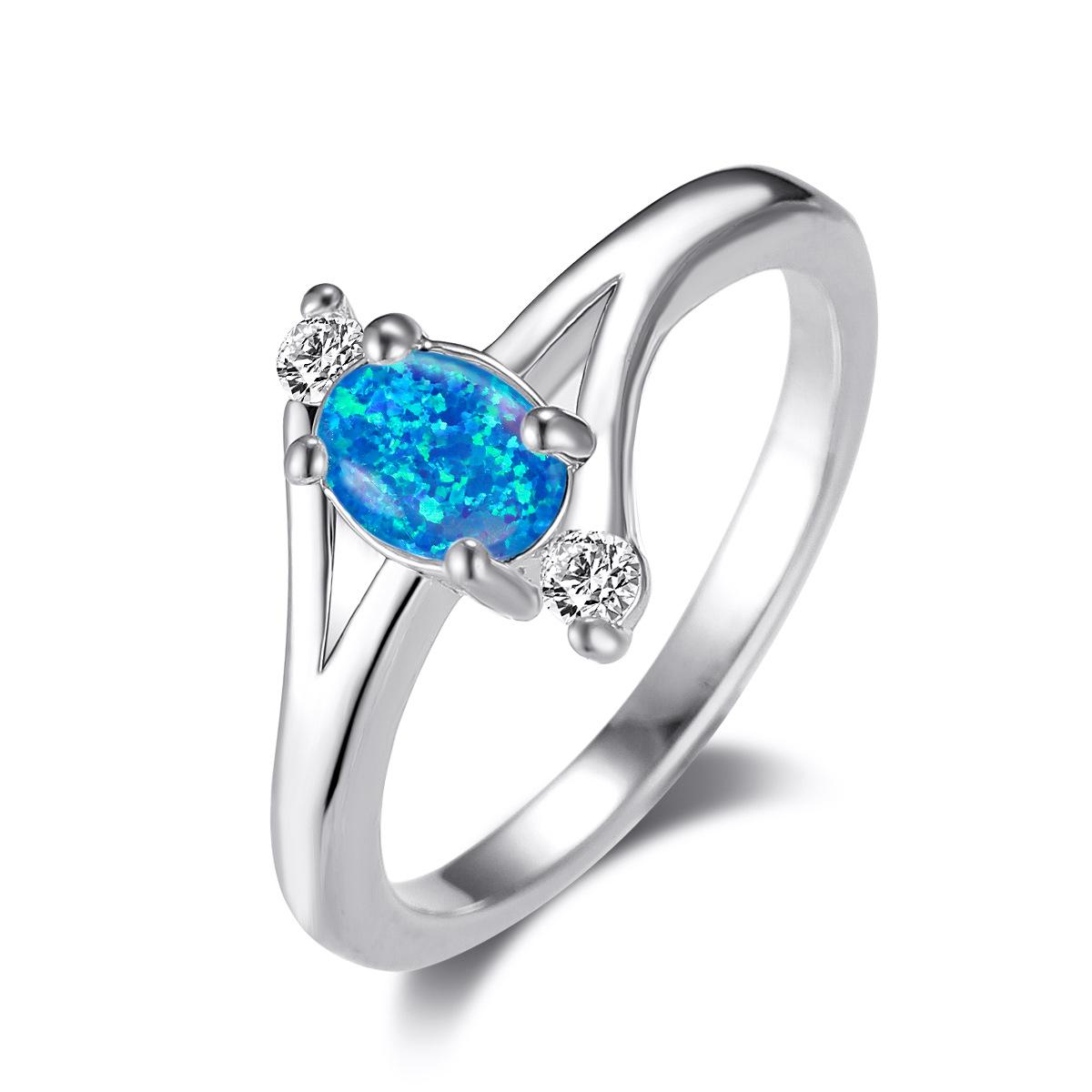New blue opal oval platinum four-claw blue opal edge white diamond, design sense ocean wind no. 6