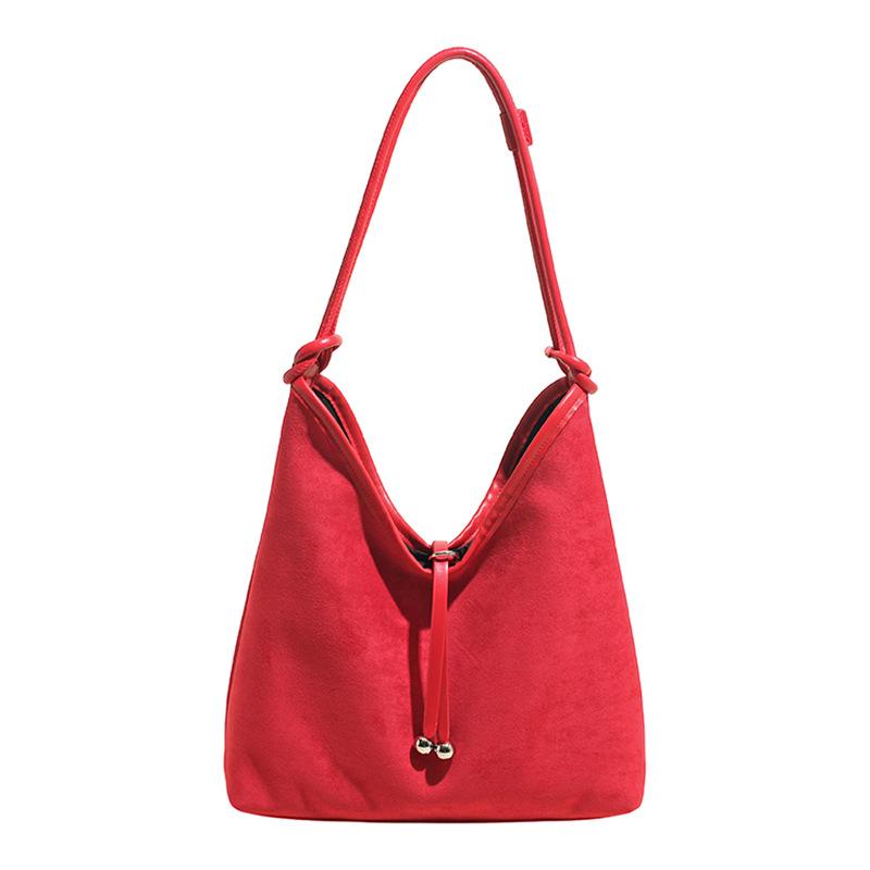 

Женские сумки сегодня популярны, с текстурой высокой вместимости на одно плечо. Новая повседневная трендовая сумка-тоут для поездок на работу. красный