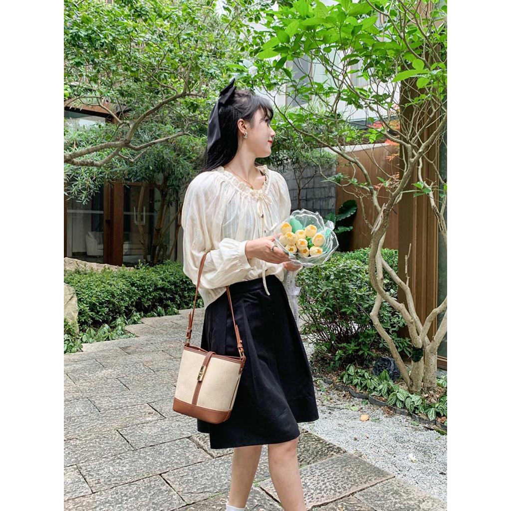 Cowhide canvas splicing bucket bag women's 2025 summer shoulder oblique span bag casual versatile underarm bag Korean version tide