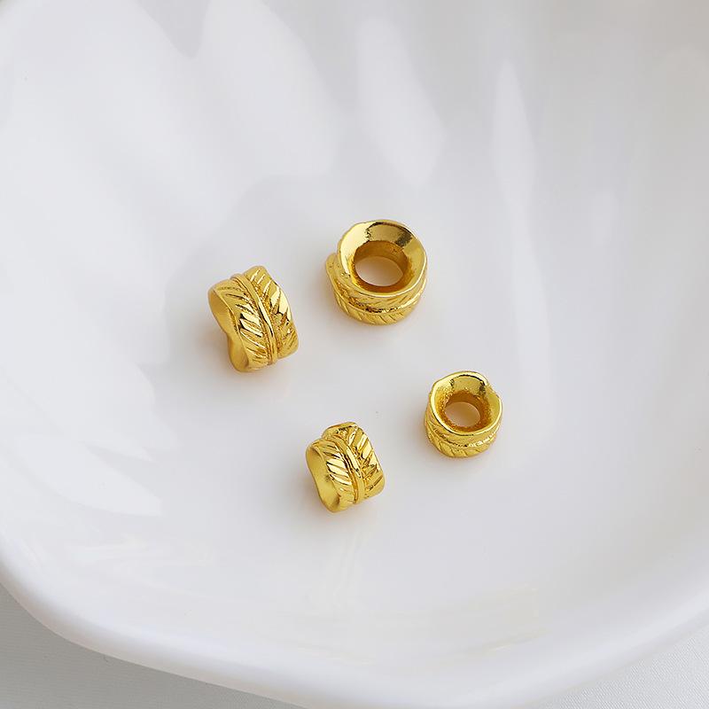 Perline distanziatori a forma di piuma placcate in oro 18 carati per la creazione di gioielli fai-da-te