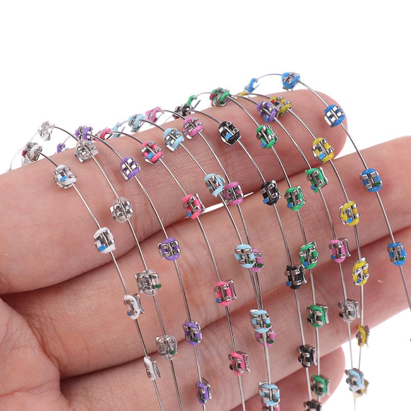 2 Stück Mode Split-Typ Mini Bunte Brackets Fake Zahnspangen Ohne Haken Temporäre Zahndekoration Metallbracket Zahnwerkzeug