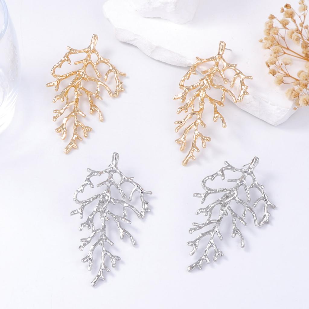 Personality trend cold wind temperament texture alloy coral stud earrings light luxury beach vacation wind women's earrings