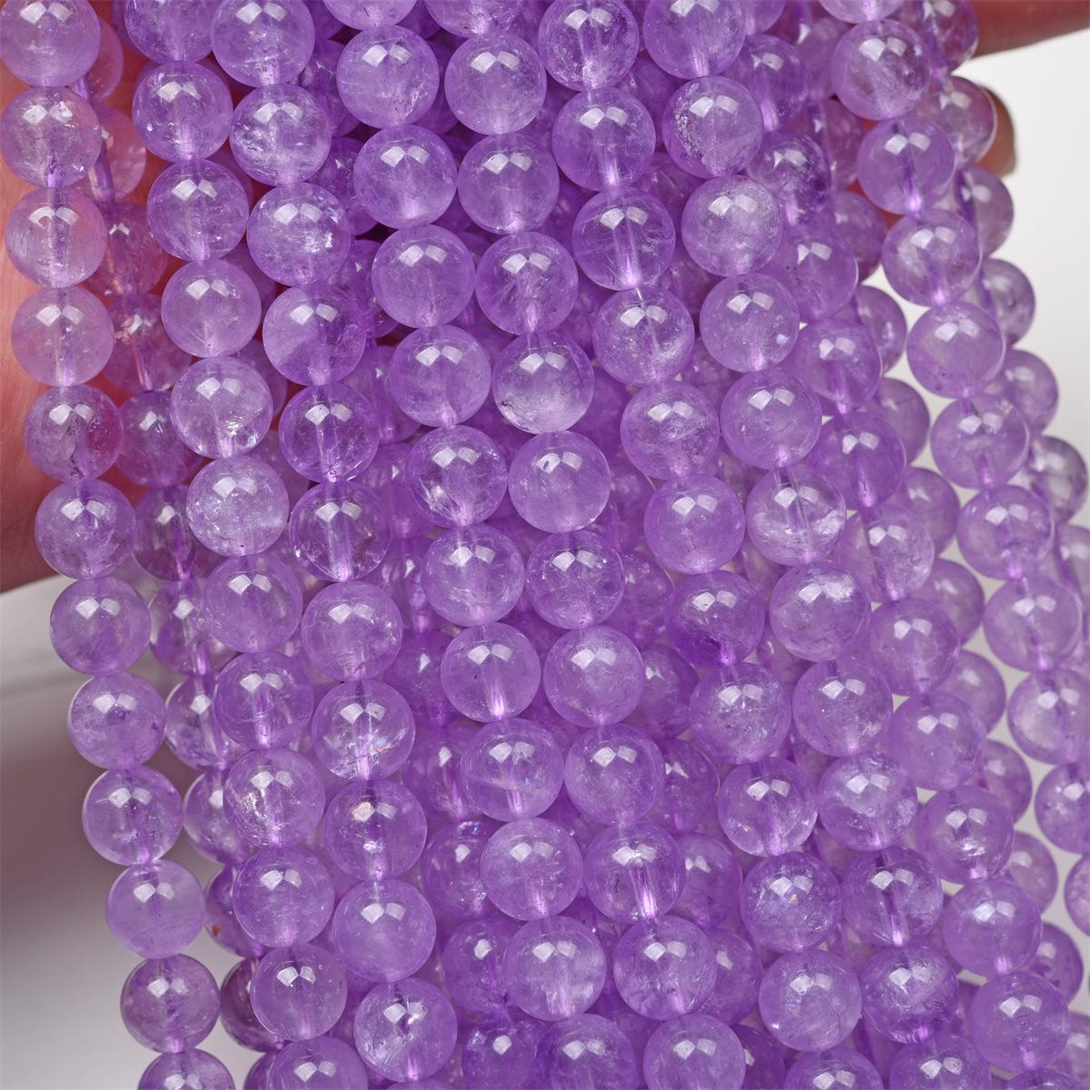 Круглые бусины из лавандового аметиста для изготовления браслетов и других украшений своими руками.