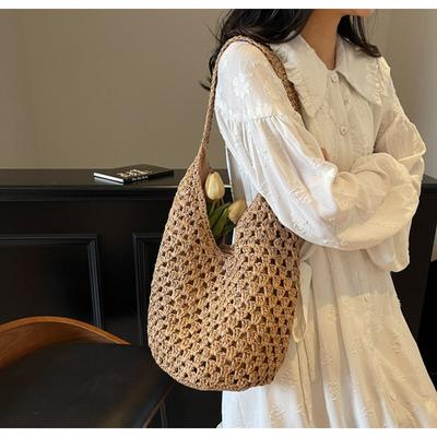 Hohle gewebte Tasche Mode Freizeit Nische Trend Große Kapazität Schulter Strohtasche Reise Strand Achseltasche