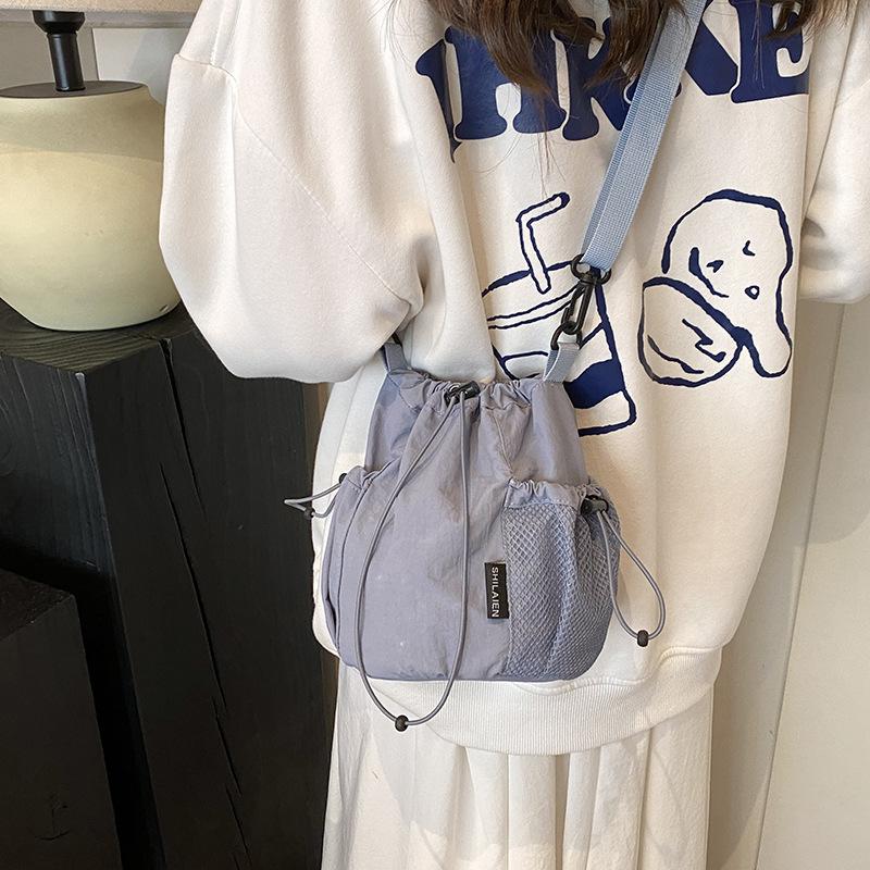 Schoolbag Women's Green Korean Version Of Casual Drawstring Nylon Bucket Bag 25 New Literary Xiaoxiangfeng Shoulder Messenger Bag