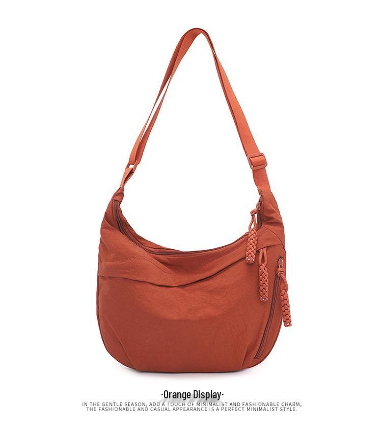 Damen 2025 High-End Wasserdichte Nylon Halbmond Umhängetasche