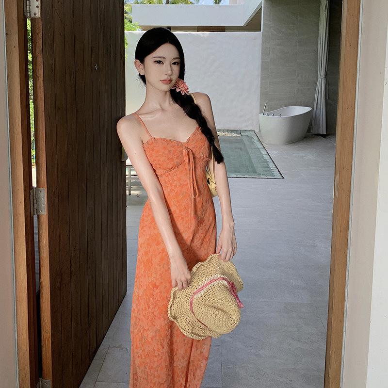 The Real Shot of the New Floral Vacation Dress Closes the Waist and Shows White and Orange Suspender Skirt.