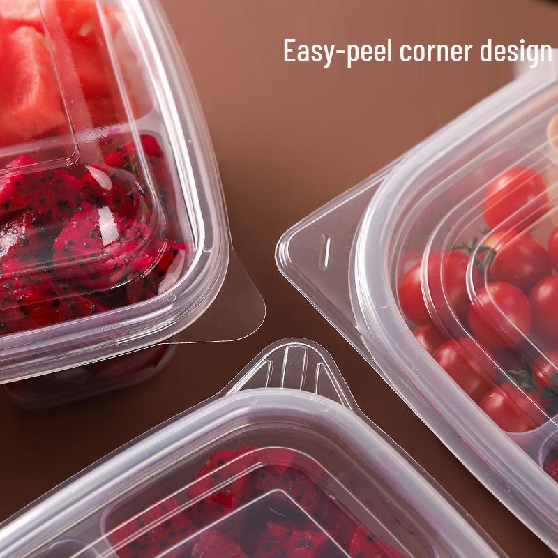 Round Transparent Disposable Fruit Box with Dividers and Lid for Fresh Slices and Salad Platter.