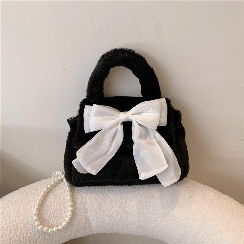 Autumn and winter new temperament fashionable plush texture simple travel small square portable bow small bag female tide