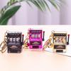 Gold-Plated Creative Tiger Fruit Machine Keychain Toy with Lottery Play Feature