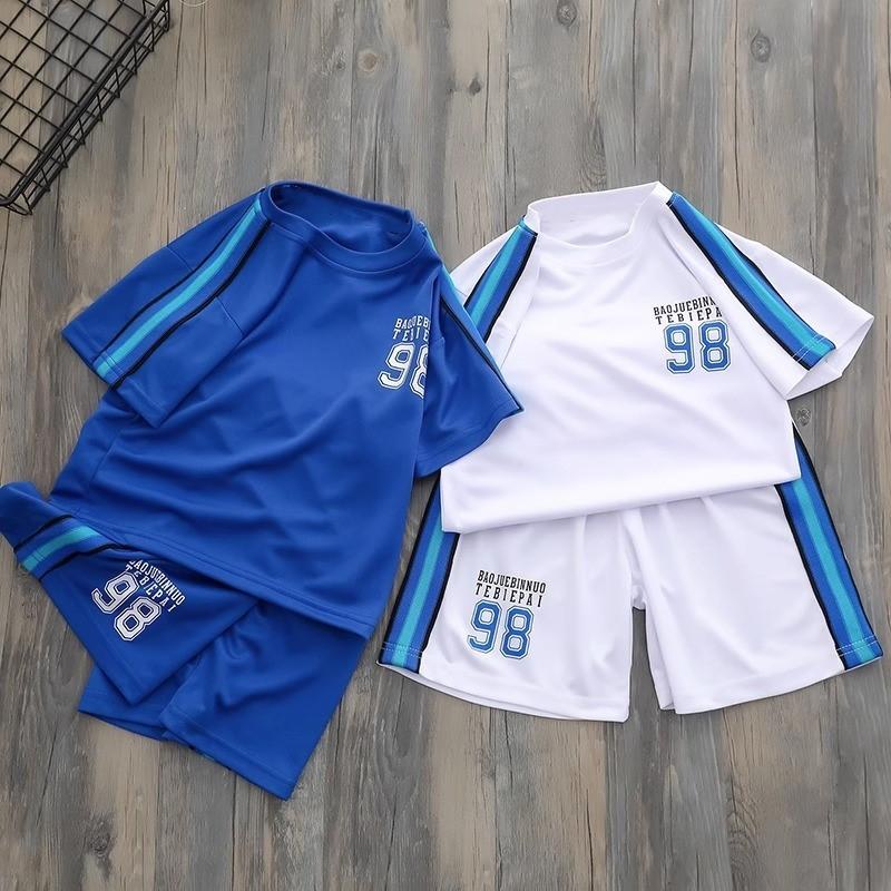Kids Basketball Uniform Set With Polyester Fabric Short Sleeve Shorts For Summer Play