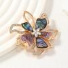 Elegant Rhinestone Bow Brooch with Imitation Abalone Shell for Coats and Sweaters - European and American Fashion Style.