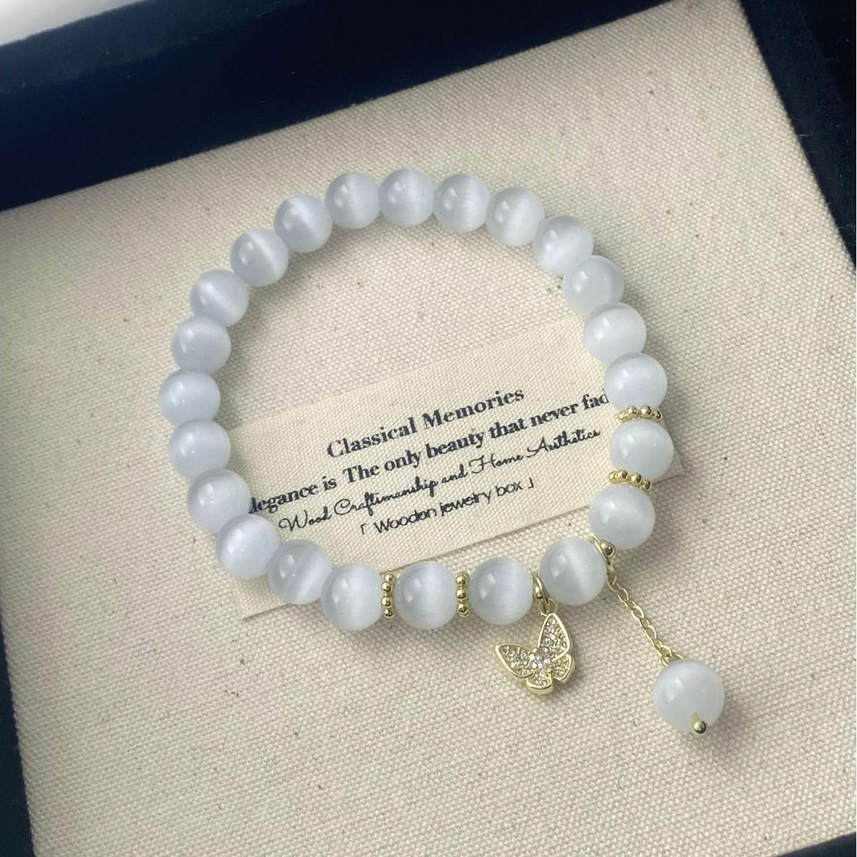 French Zircon Butterfly Cat s Eye Beaded Bracelet - Elegant, Luxurious, and Fashionable Hand Jewelry