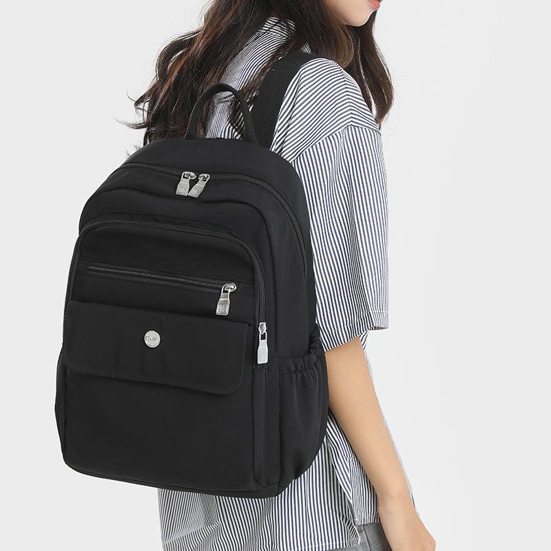 Einfarbiger Rucksack Große Kapazität Outdoor-Reisetasche Studenten Leichter Pendlerrucksack