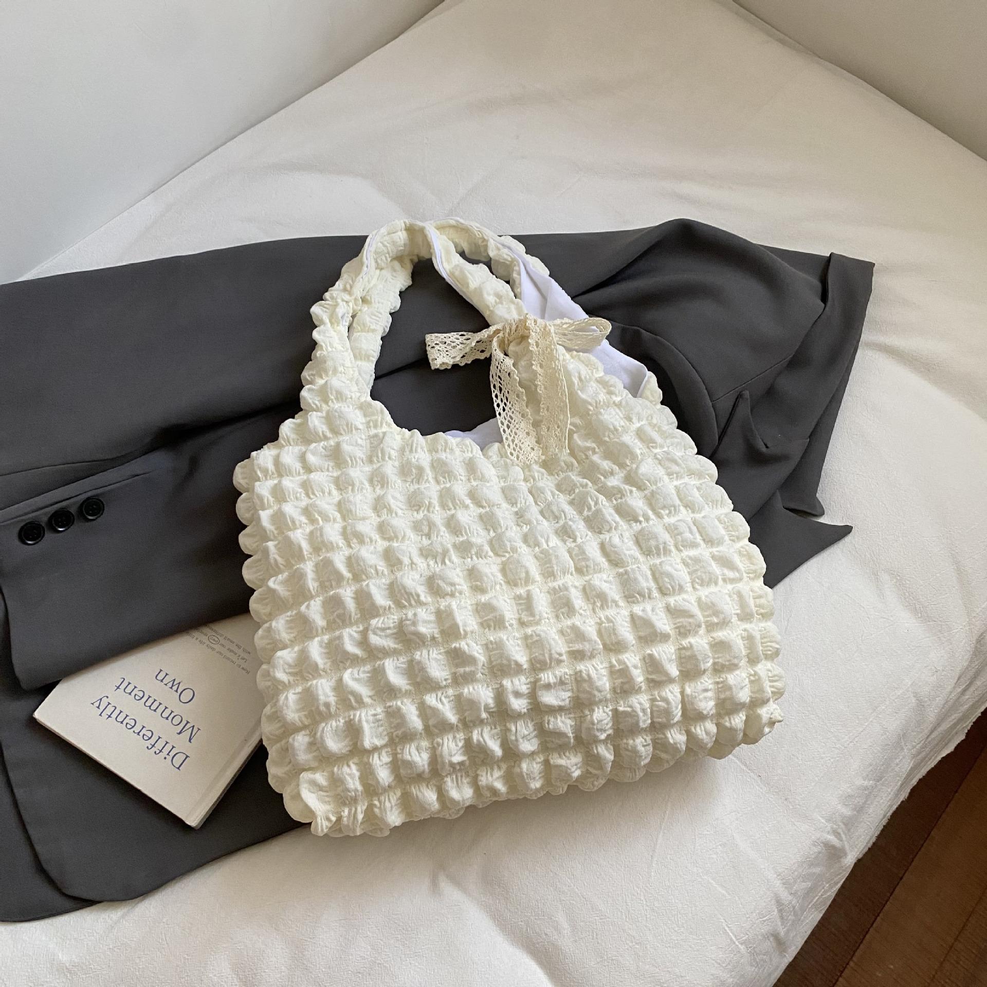 

Bubble fresh foreign style 2025 autumn new pleated large capacity laser bow large capacity shoulder handbag women