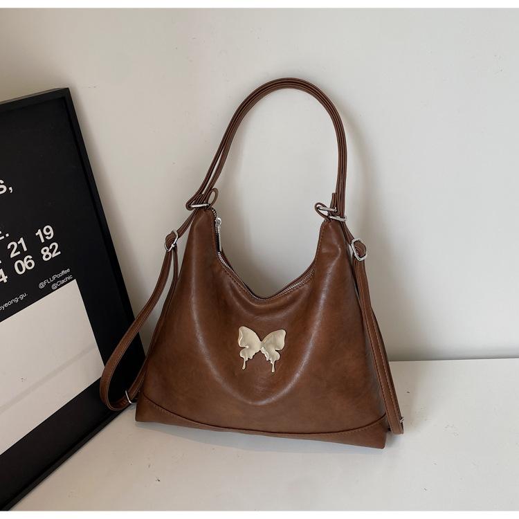 

Retro popular butterfly backpack niche design big bag women s 2025 new handbag single shoulder tote bag tide коричневый