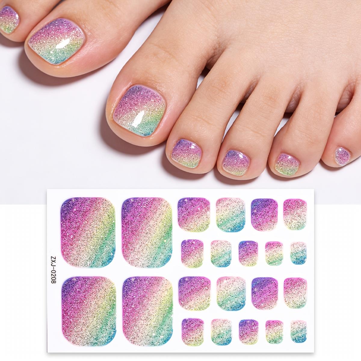 

1 set of rainbow gradient glitter toenail stickers—dreamy and sparkling full-nail stickers for spring and summer. Easy to apply.