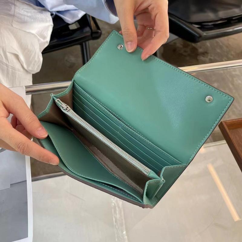 New Genuine Leather Women's Wallet With Lychee Pattern Long Design And Three Fold Rivets Featuring Contrasting Colors Inside. Cross Border Wallet