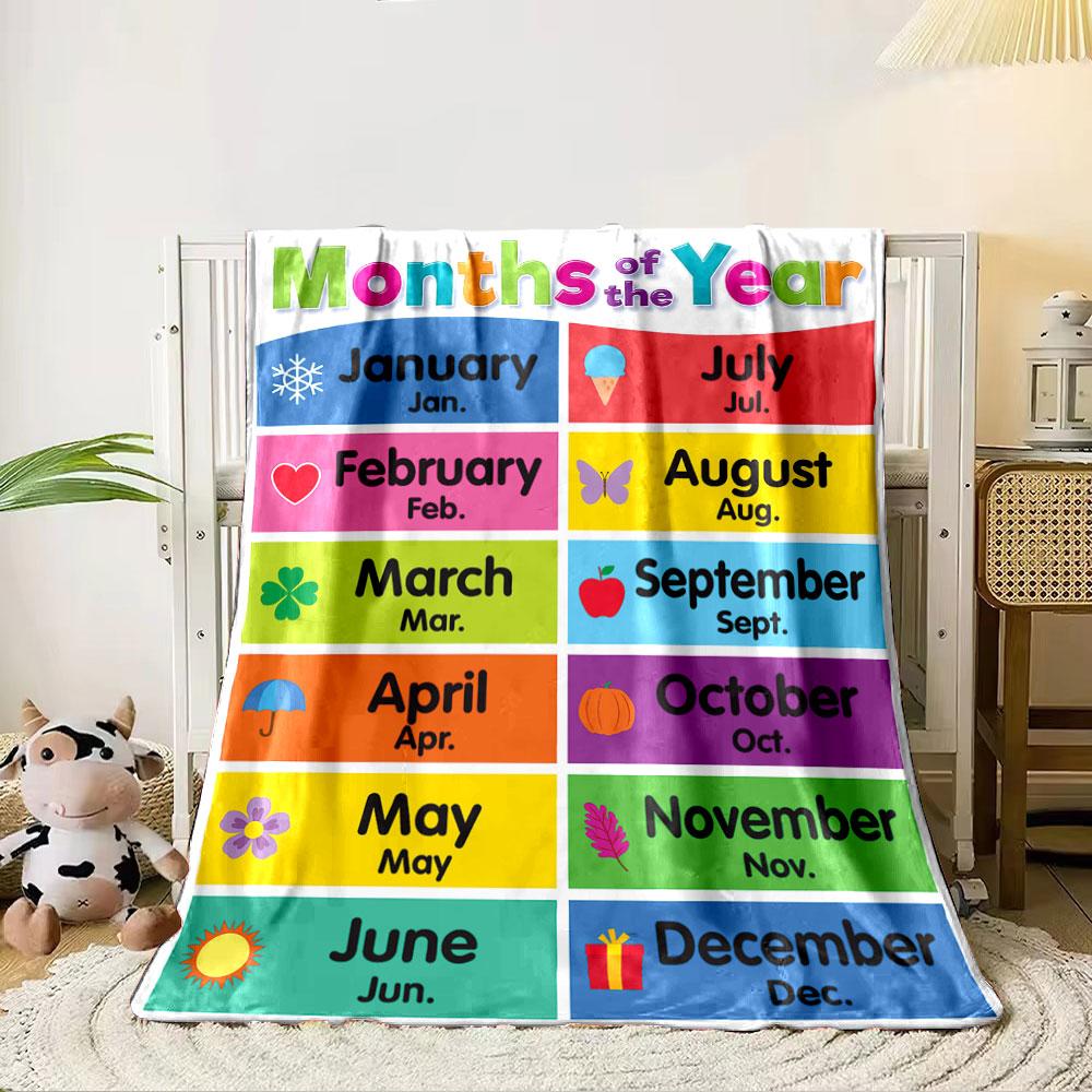 Months are listed with colorful backgrounds and seasonal-themed icons. for all seasons blanket lunch break throw gift 80cm x 120cm