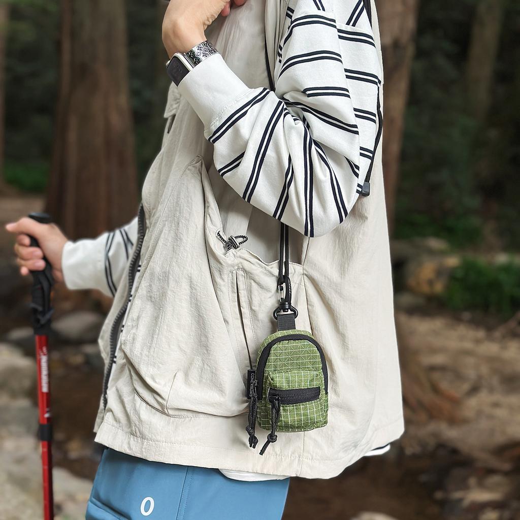 Mini neck bag men's and women's trendy backpack hanging bag messenger bag outdoor portable small backpack mini change earphone bag