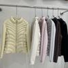 Knitted splicing sleeves waist slim fit light down jacket women's ribs autumn and winter small white duck down jacket