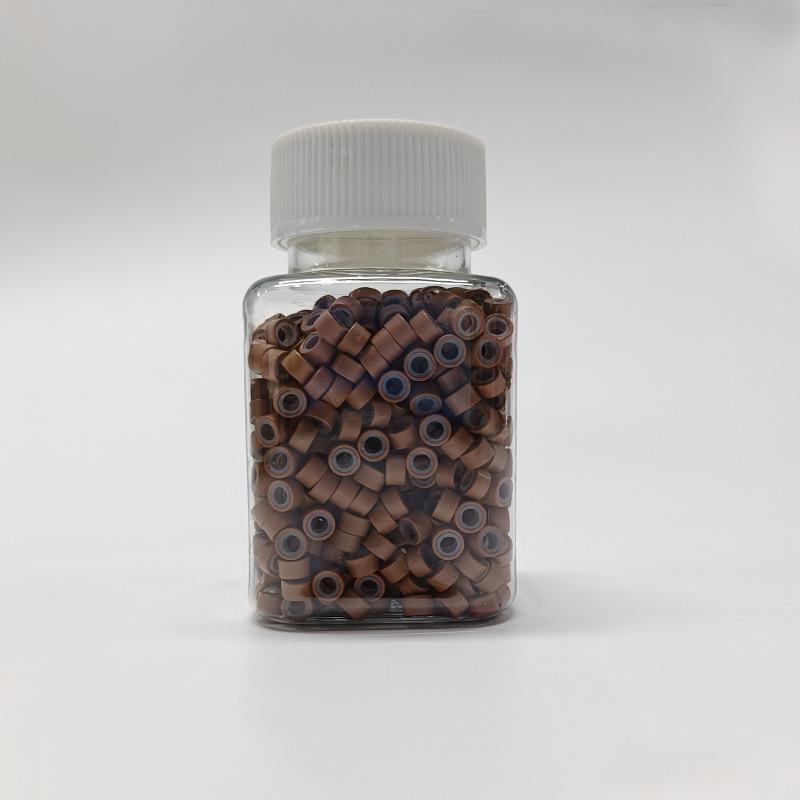 

Бесшовное кольцо для наращивания волос с силиконовой ручкой и золотой проволокой 1000 pieces bottle