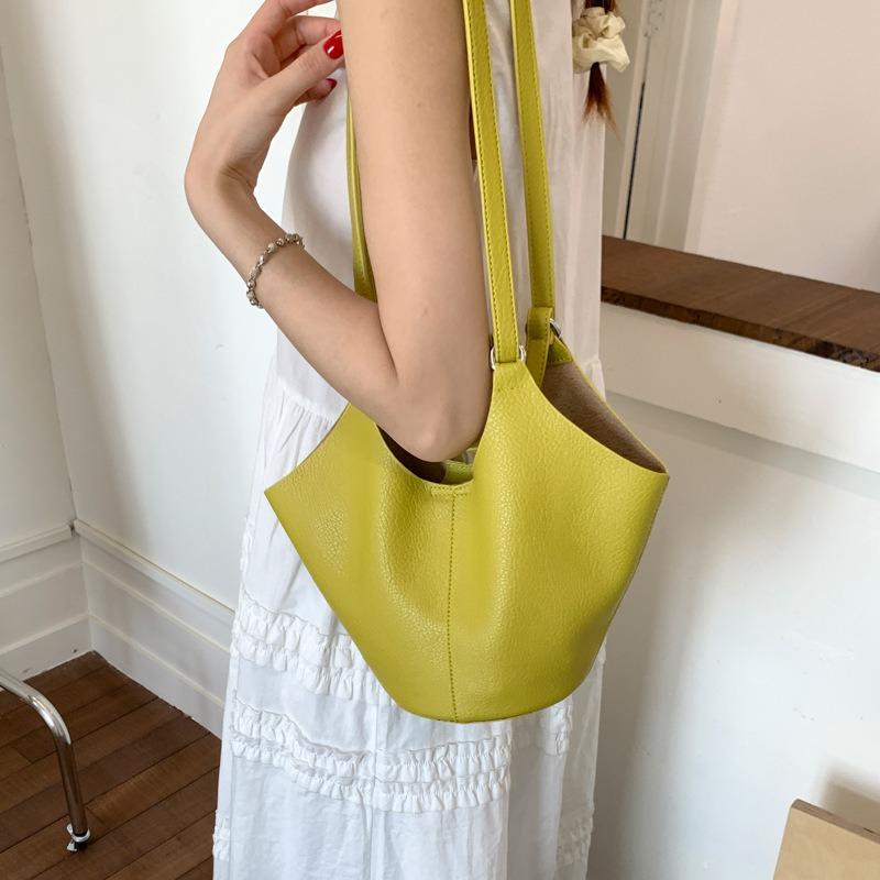 Niche high-end soft leather vegetable basket hand carrying bucket bag women's new commuter shoulder armpit bag