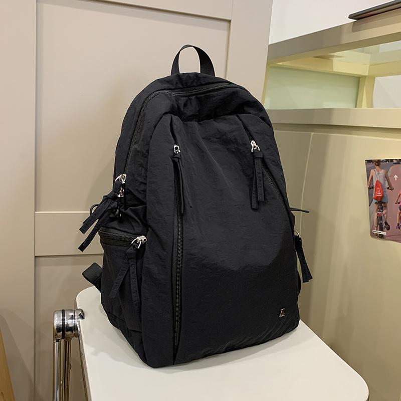 Japanese casual schoolbag female college student simple solid color backpack female versatile lightweight junior high school student computer backpack