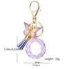 A-Z Resin Letter Keychain with Purple Butterfly Tassel Pendant for Women's Bags