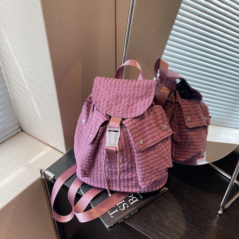 

Новый женский повседневный универсальный студенческий рюкзак, легкий, портативный, в клетку, с высокой ценностью, для поездок на работу, маленький рюкзак фиолетовый