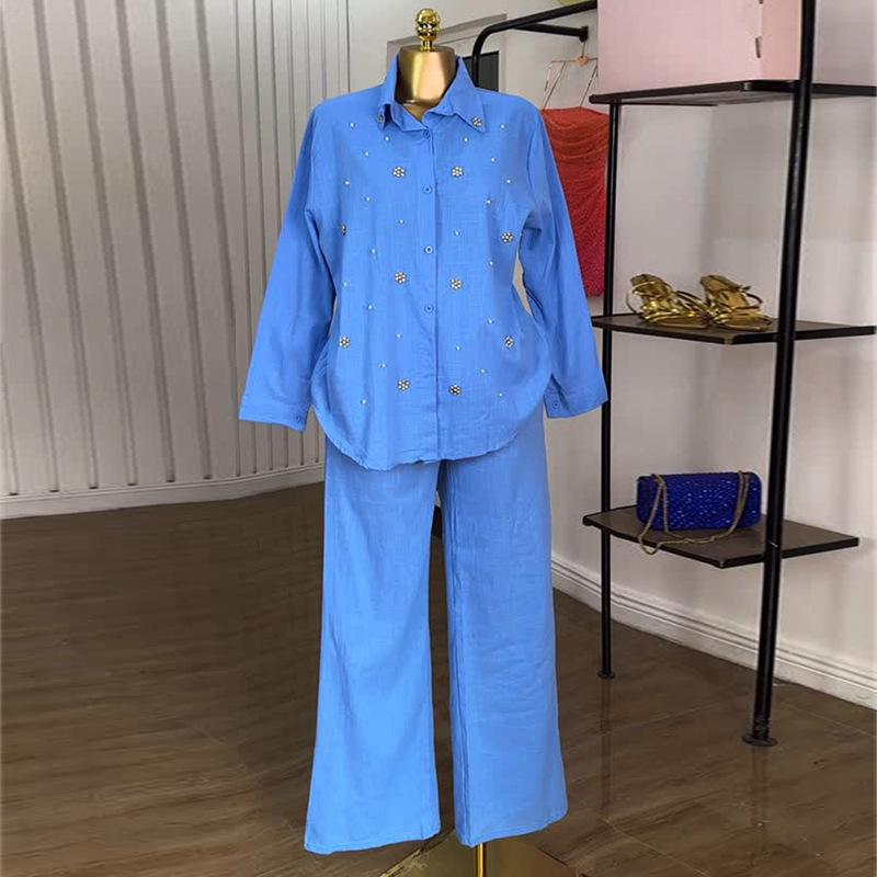 

Европейский и американский женский летний комплект из двух предметов 2025 года: Милая свежая рубашка с лацканами и бисером и брюки прямого кроя с высокой талией. L синий