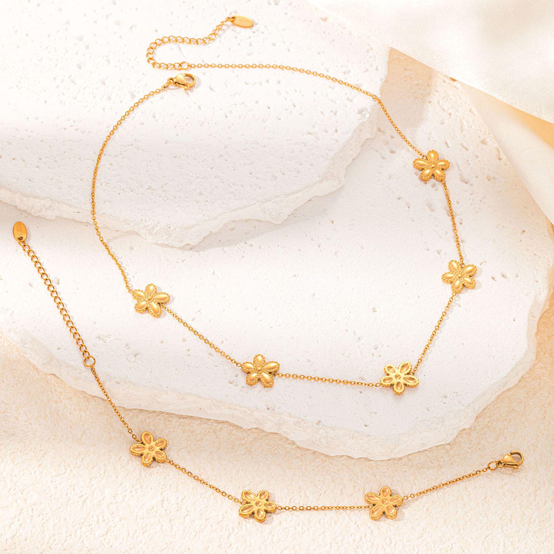 

Stainless Steel Floral Round Bracelet & Necklace Set