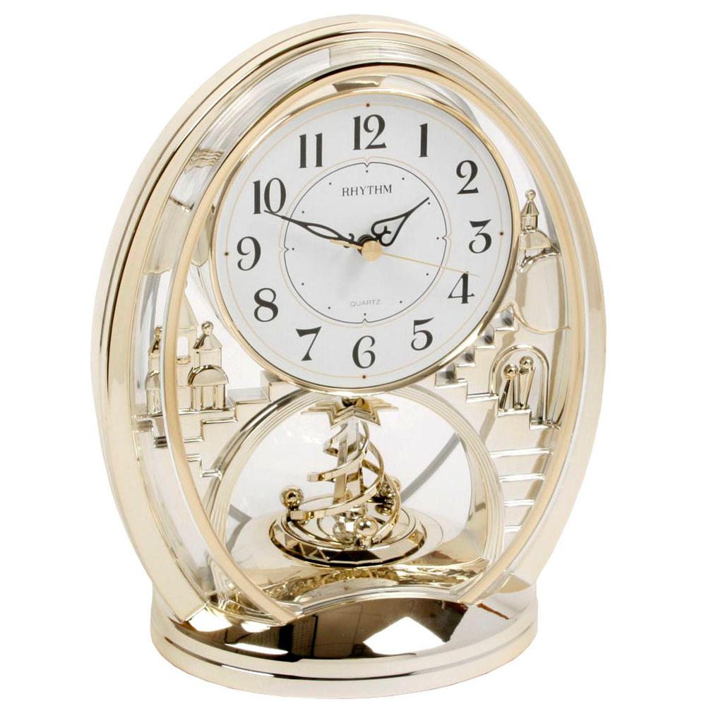 Rhythm Cont Mantel Clk Oval Gilt/Arabic Dial/Rotating Pend