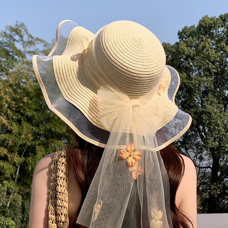 Straw hat women's summer seaside big brim sun hat new outdoor travel leisure wave three-dimensional flower streamer sun hat