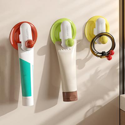 Adhesive Wall Hook Bathroom Toothpaste Hanger Hook Wall Mounted Clip Hook for Toothpaste Towel Hair Tie Kitchen Storage