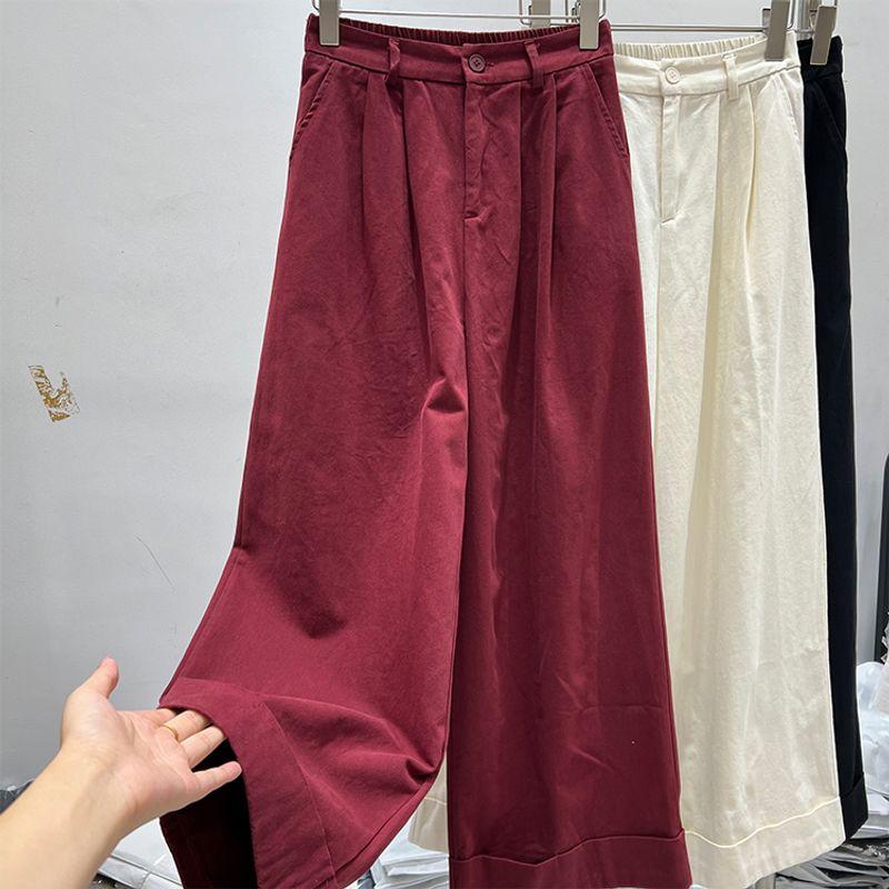 

Винно-красные брюки свободного кроя с высокой талией и волнистым низом для ранней осени Red M