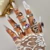 European and American new dripping butterfly imitation gemstone and diamond ring set Geometric twist ring seven-piece set