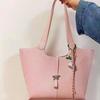 New shoulder bag, wind chime, large-capacity commuter handbag, women's bag fashion