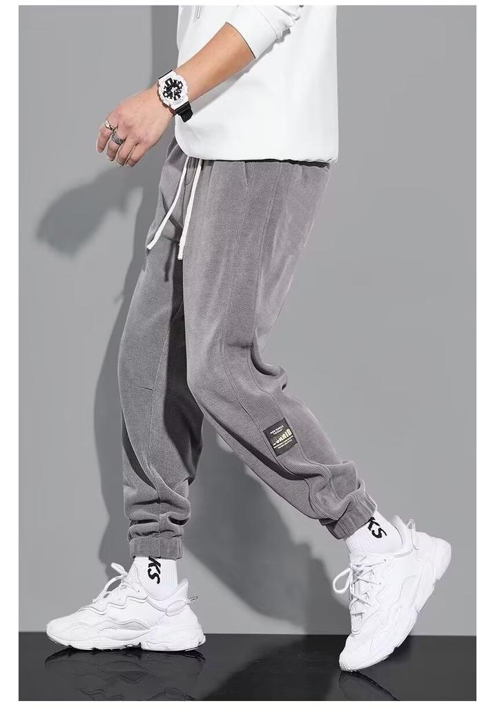 Fleece tied feet casual pants men's autumn and winter thickened men's casual sports pants Korean version loose nine-point pants