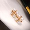French natural freshwater pearl earrings ins niche design sense 11k gold injection woven four-leaf clover stud earrings commuter women